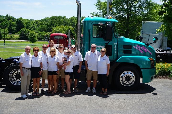 D.M. Bowman began in 1959 when Don Bowman started as an owner-operator with a used B 61 Mack tractor and trailer. Here the family gathers at the company's 60th anniversary celebration. -...
