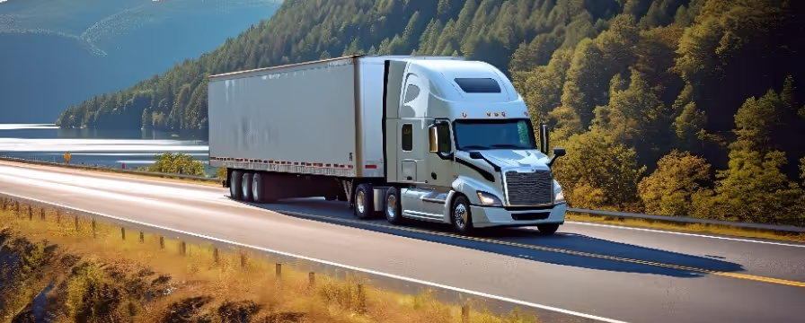 A tractor trailer travelling on the highway